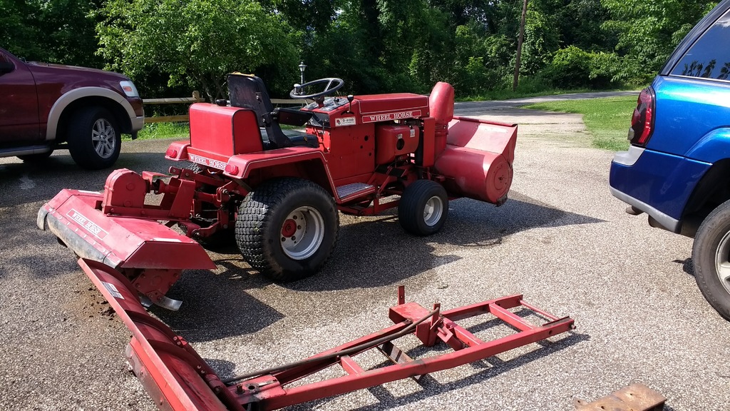 Wheel Horse D200 Tractor w/ Mower, Tiller, Snow Plow, and Snow Blower