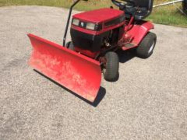 Got the plow on little red!