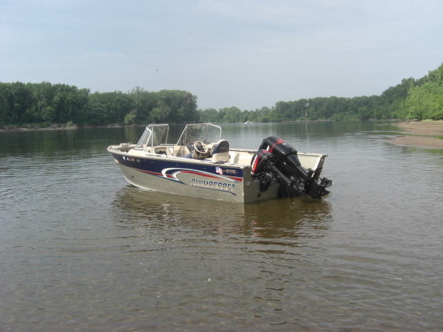 Rear shot of boat on the river.png