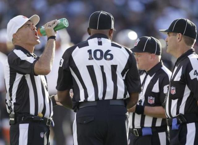 Punter-NFL-refs-need-to-kiss-and-make-up