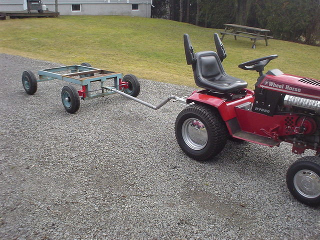 56ed6927e7e80_Wagonhitchedtotractorlowre