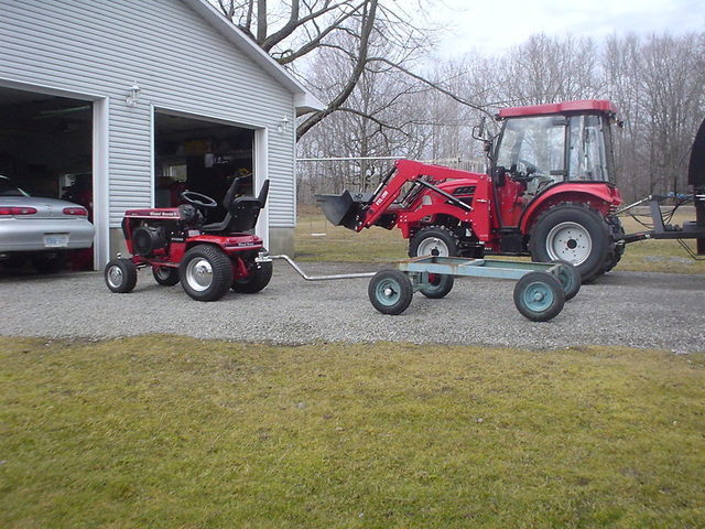 56ed69330d317_Wagonhitchedtotractorlowre