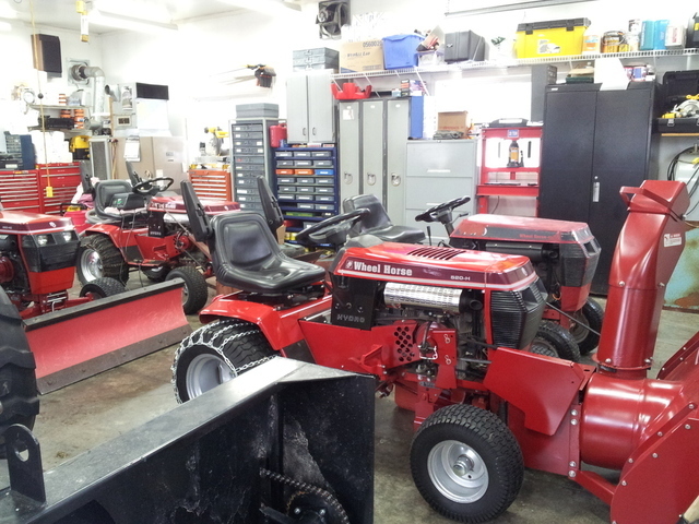 56eef74a8394c_Tractorsingaragefront.thum