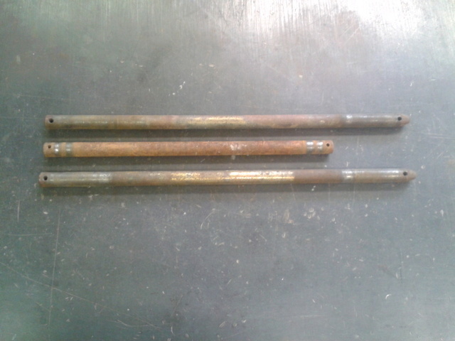 Snow blade pins as removed 2.jpg