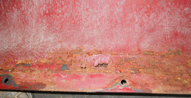 Snow blade closeup of rust hole #1.jpg