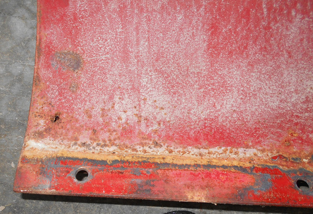 Snow blade closeup of rust hole #2.jpg