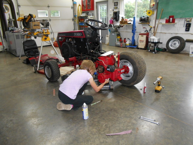 Bailey cleaning Wheel Horse 1.jpg