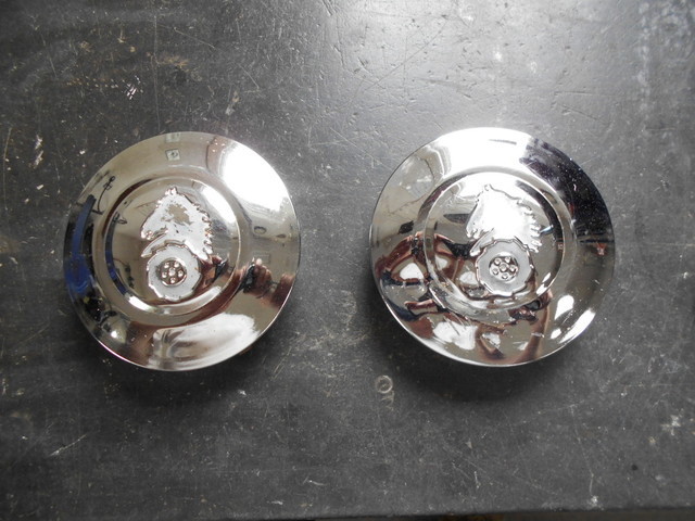 Hubcaps and snow blower 001.jpg