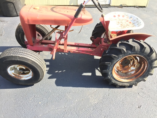 I came across this old wheel horse in a gentleman's yard he used it as...