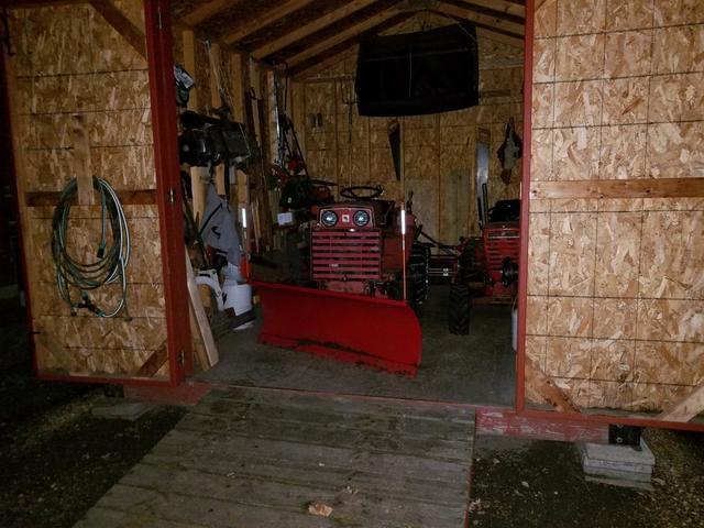 D 180 stuffed into shed.jpg