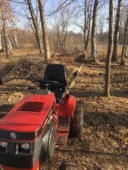 520 pulling down a hung up tree.