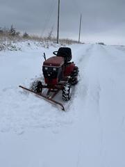 wheel horse in snow.jpg