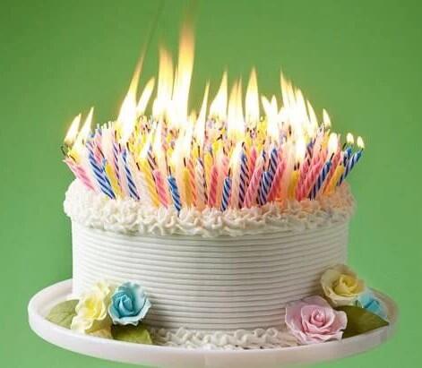 Candles_on_a_birthday_Cake_grande.jpg.ef764bc0af64c1513e0b0ac3e29349a8.jpg