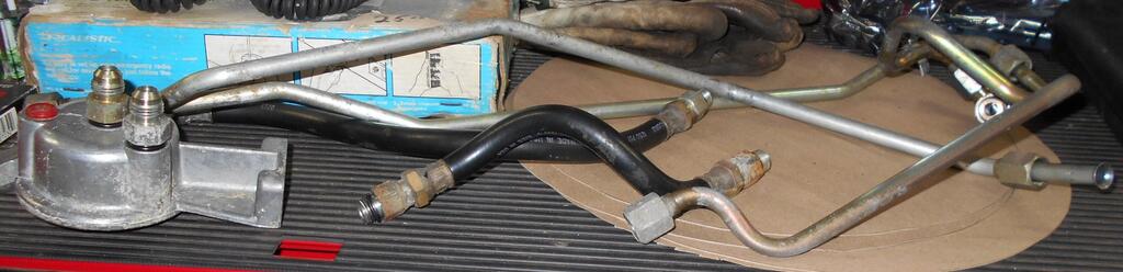 2104312921_Hydraulicpipesandhosescleanedup.JPG.137d36b679fdf6aae8da0e783dd422d1.JPG