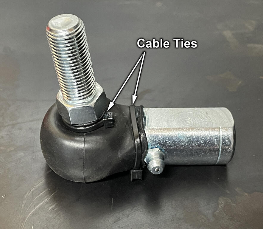 rod-end-with-boot-and-cable-ties-smaller-image.jpg.5ddae902ad18c8f387f221e11913f629.jpg