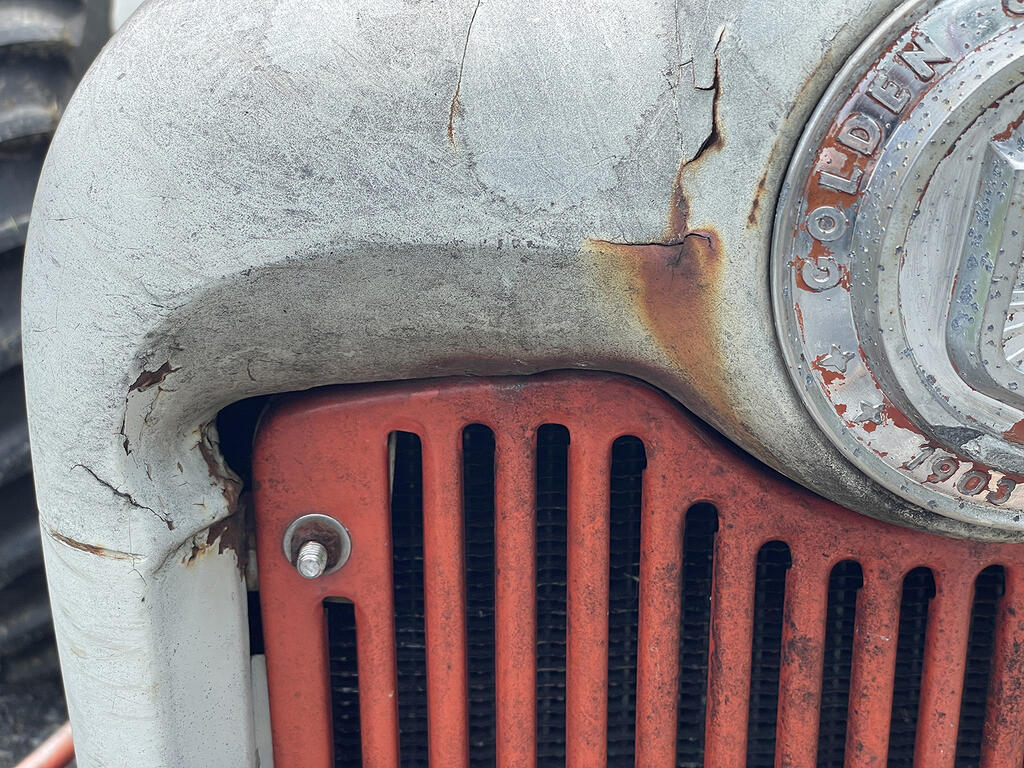 tractor-hood-repair-before-1-smaller-image.jpg.45c531e36b27a4090fc34a47683b7215.jpg