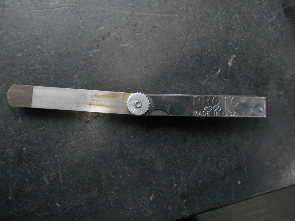 1051071660_Feelergaugeusedtocheckintakevalveclearance.JPG.ff9819203818fc01a2fd41128052a8a9.JPG