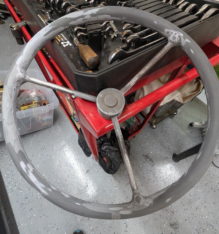 154477747_SteeringWheelcoatingstripped.jpg.56640658495faa6d5d26a0e71899c6aa.jpg