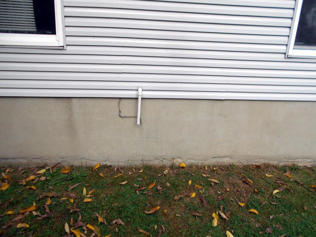 Garage_mini_split_outside_drain_complete.JPG.e049bd6bc8f32a72c3a3ee29cf31a827.JPG