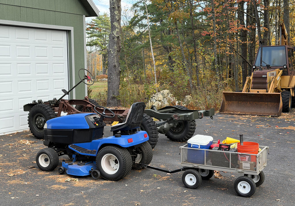 new-holland-wheel-horse-with-cart-smaller-image.jpg.ee7f3334bdafd88440ef70d813f542f4.jpg